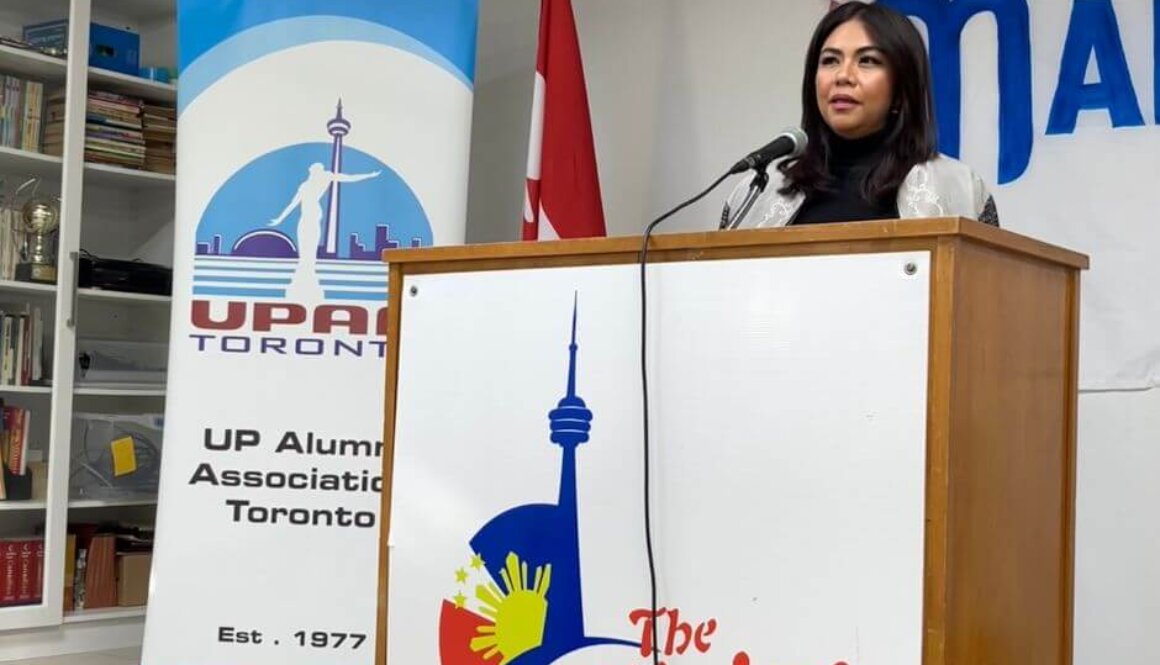 Filipina McLuhan Fellow winner Karmina Constantino is pictured speaking at a podium labeled The Filipino Centre