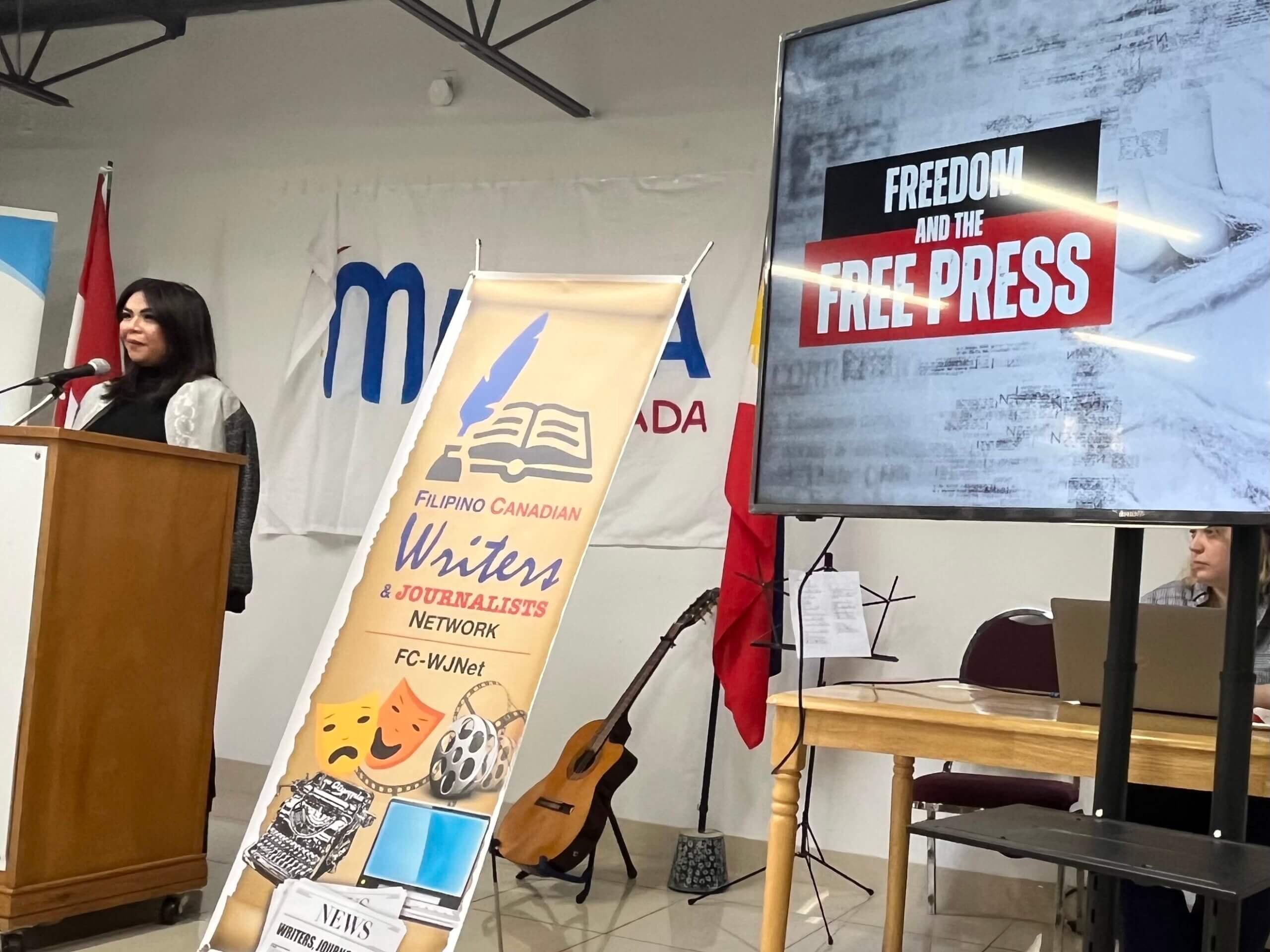 Karmina Constantino is shown speaking at the Filipino Centre in Toronto
