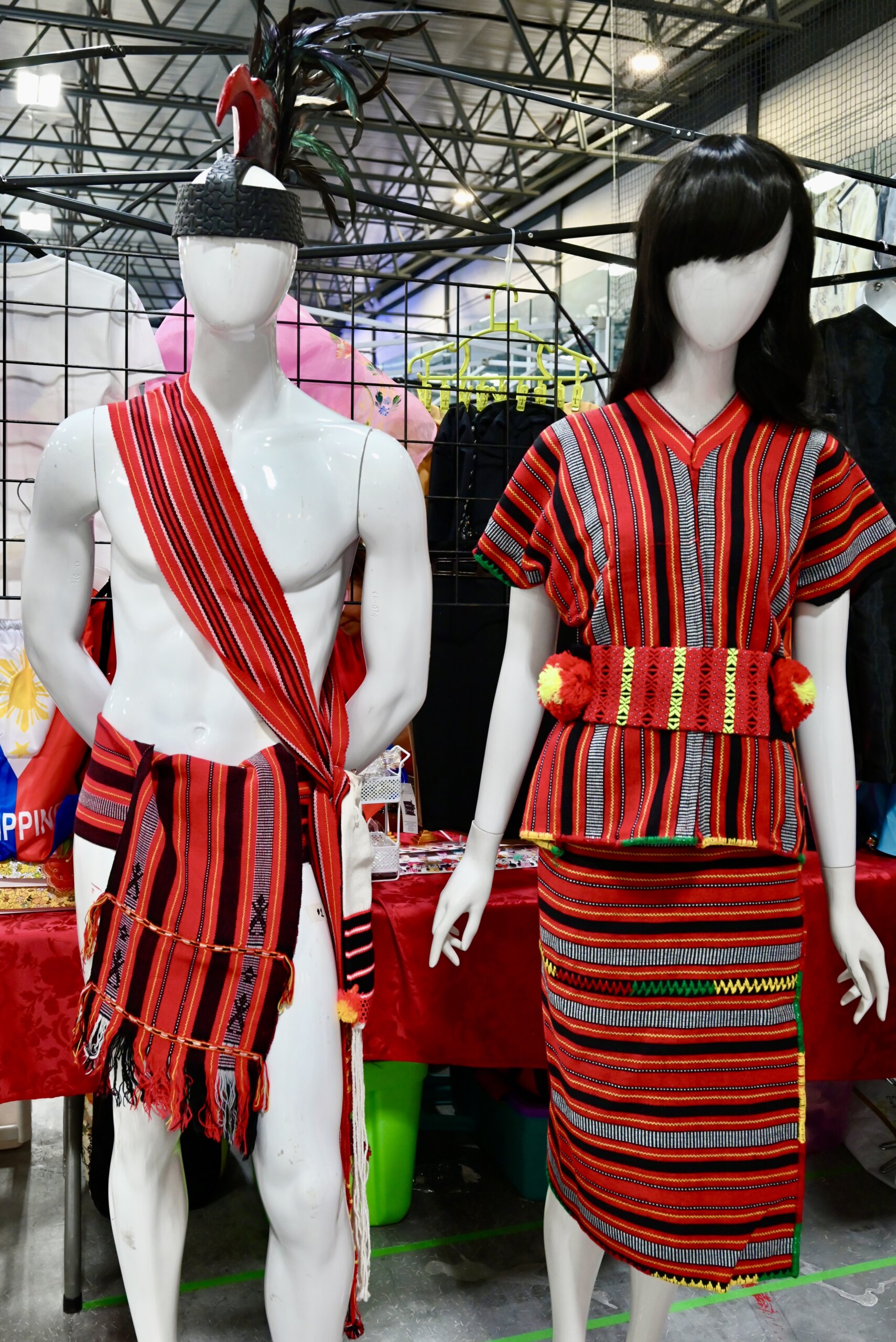 Traditional red, yellow and black Igorot attire from the northern part of the Philippines is shown at the front entrance of the Philippines Pavilion at the Carassauga Festival.