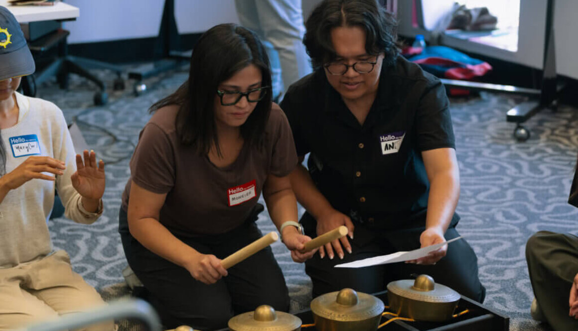 Participants practise kulintang under the guidance of facilitators during Echoes of Home at OCAD University on Aug. 4. The workshop introduced attendees to the instrument's history, cultural significance and performance techniques. Photo by Luis Miguel De Castro